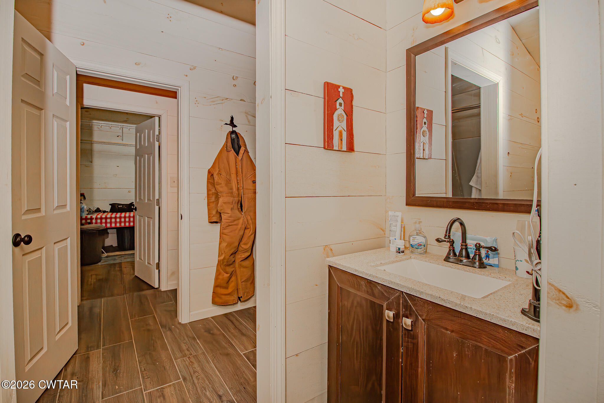 445 Wesley Lake Road Brownsville, TN 38012 - Photo 14 of 21 a bathroom with a sink and a mirror