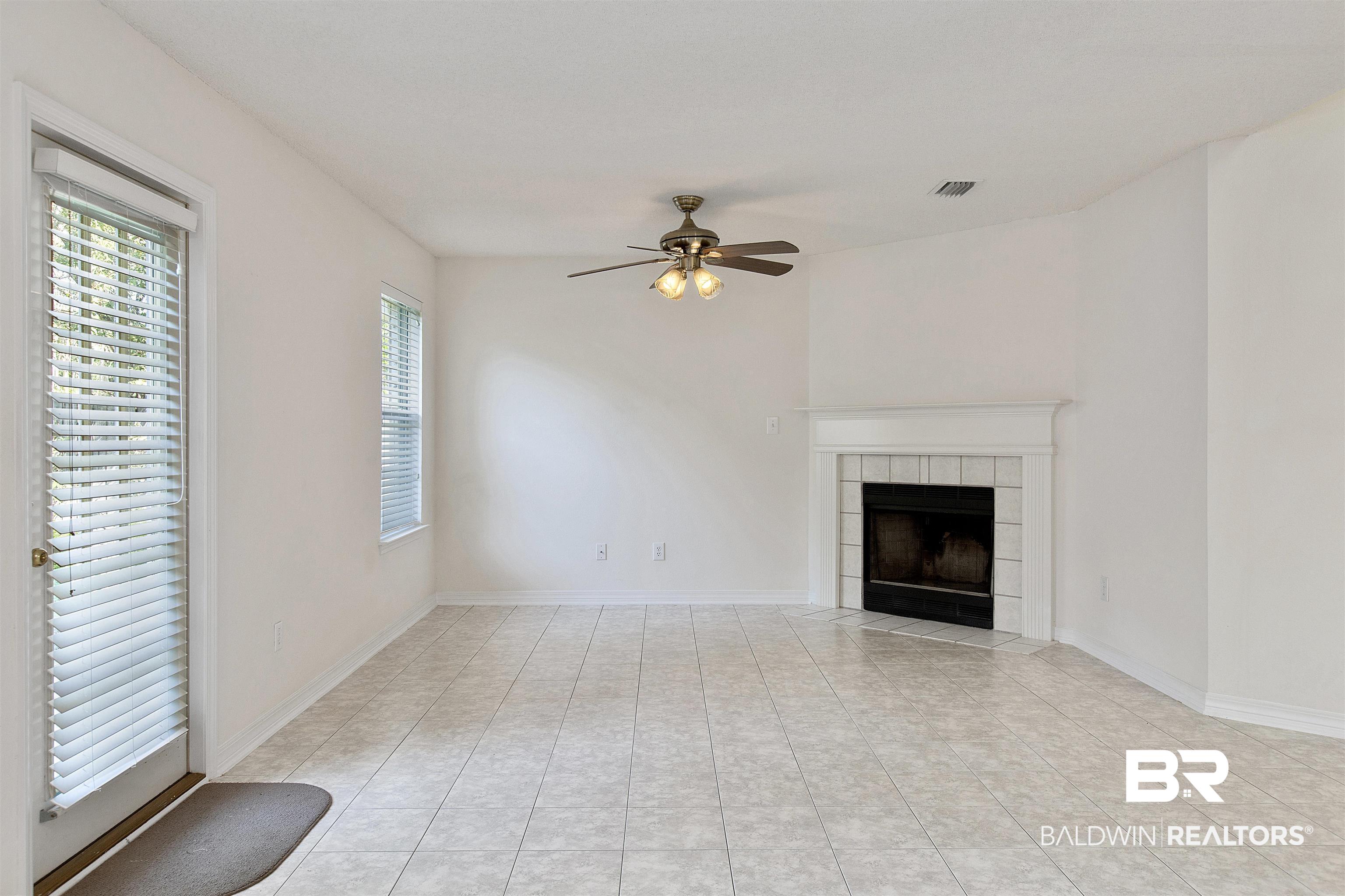 133 Kemper Lane Fairhope, AL 36532 - Photo 11 of 27 Den with Fireplace