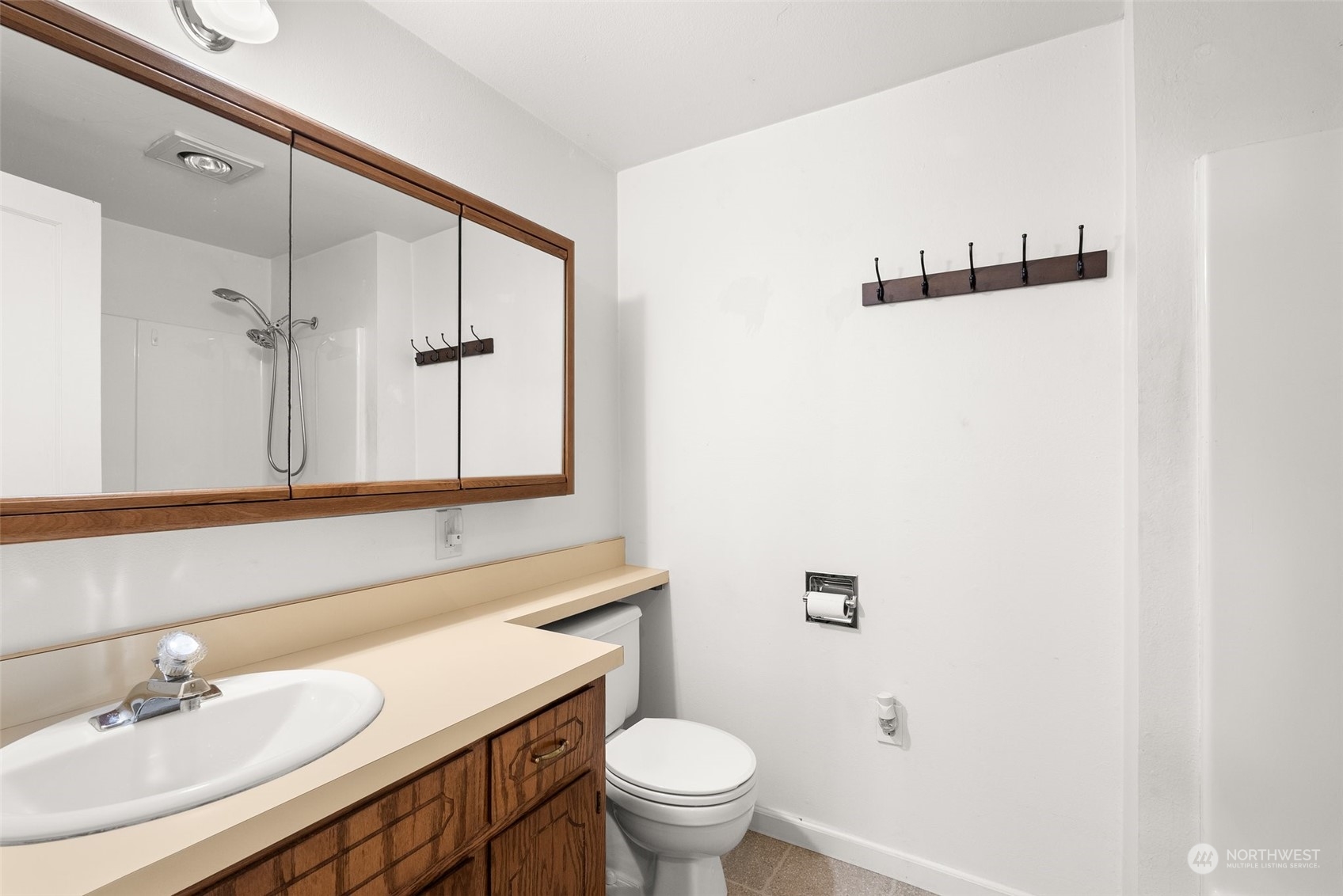 360 Highway 7 Morton, WA 98356 - Photo 16 of 23 a bathroom with a sink a toilet and a mirror