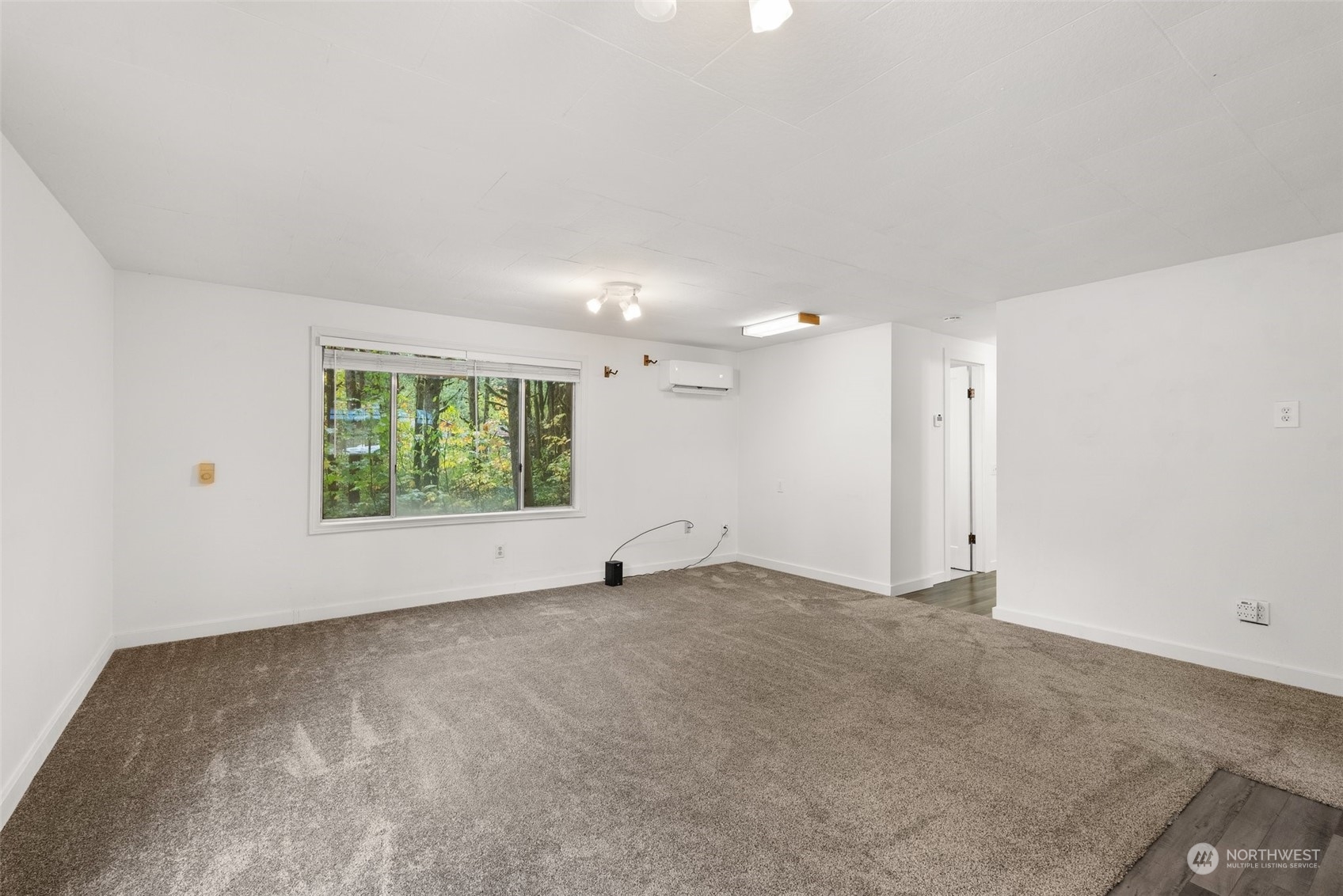 360 Highway 7 Morton, WA 98356 - Photo 6 of 23 an empty room with windows