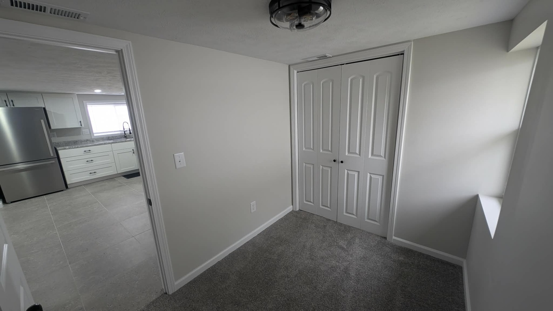 720 East Marion Street Clinton, IL 61727 - Photo 11 of 22 a view of a hallway with wooden floor and a cabinet
