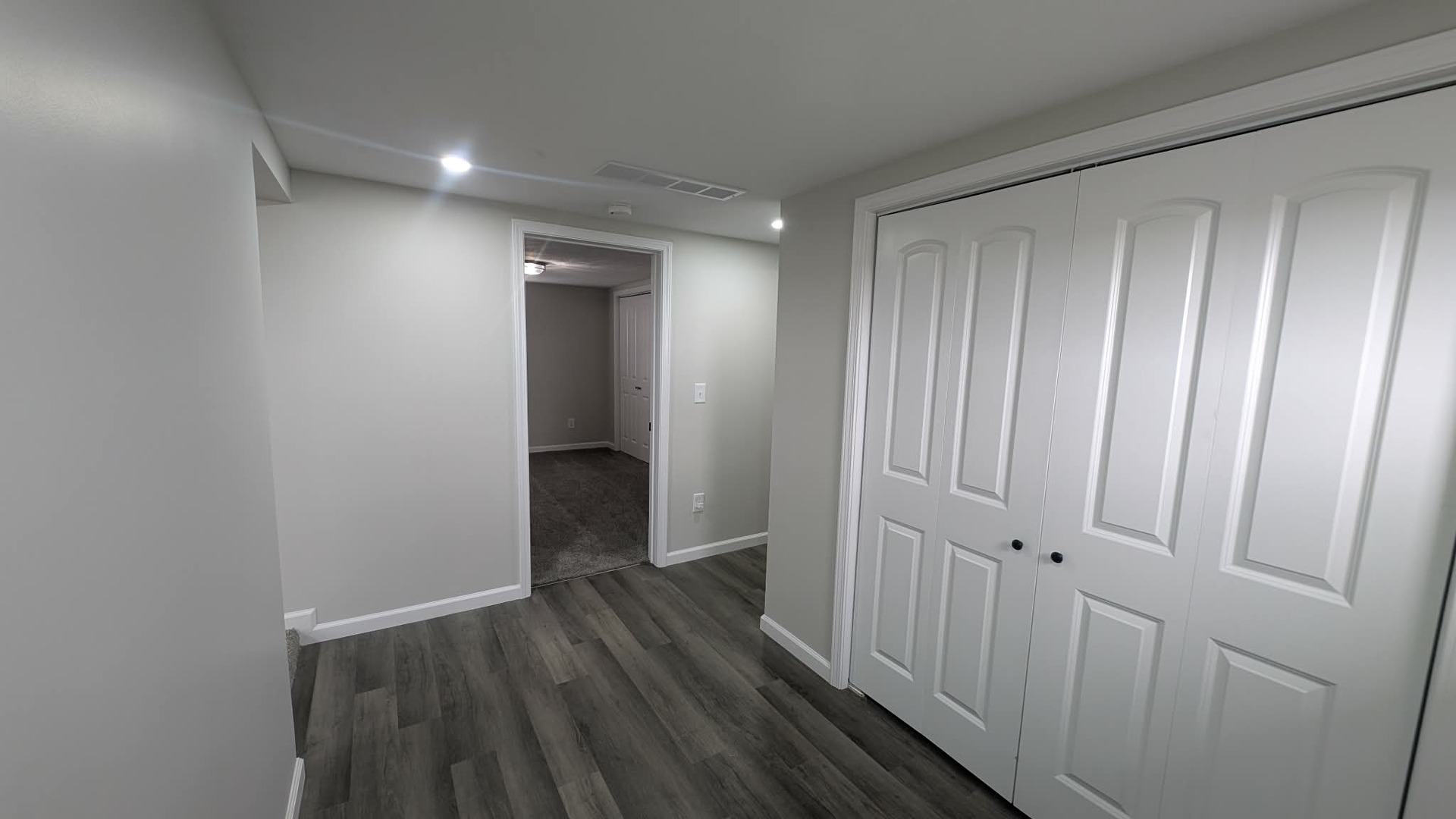 720 East Marion Street Clinton, IL 61727 - Photo 16 of 22 a view of a hallway with wooden floor