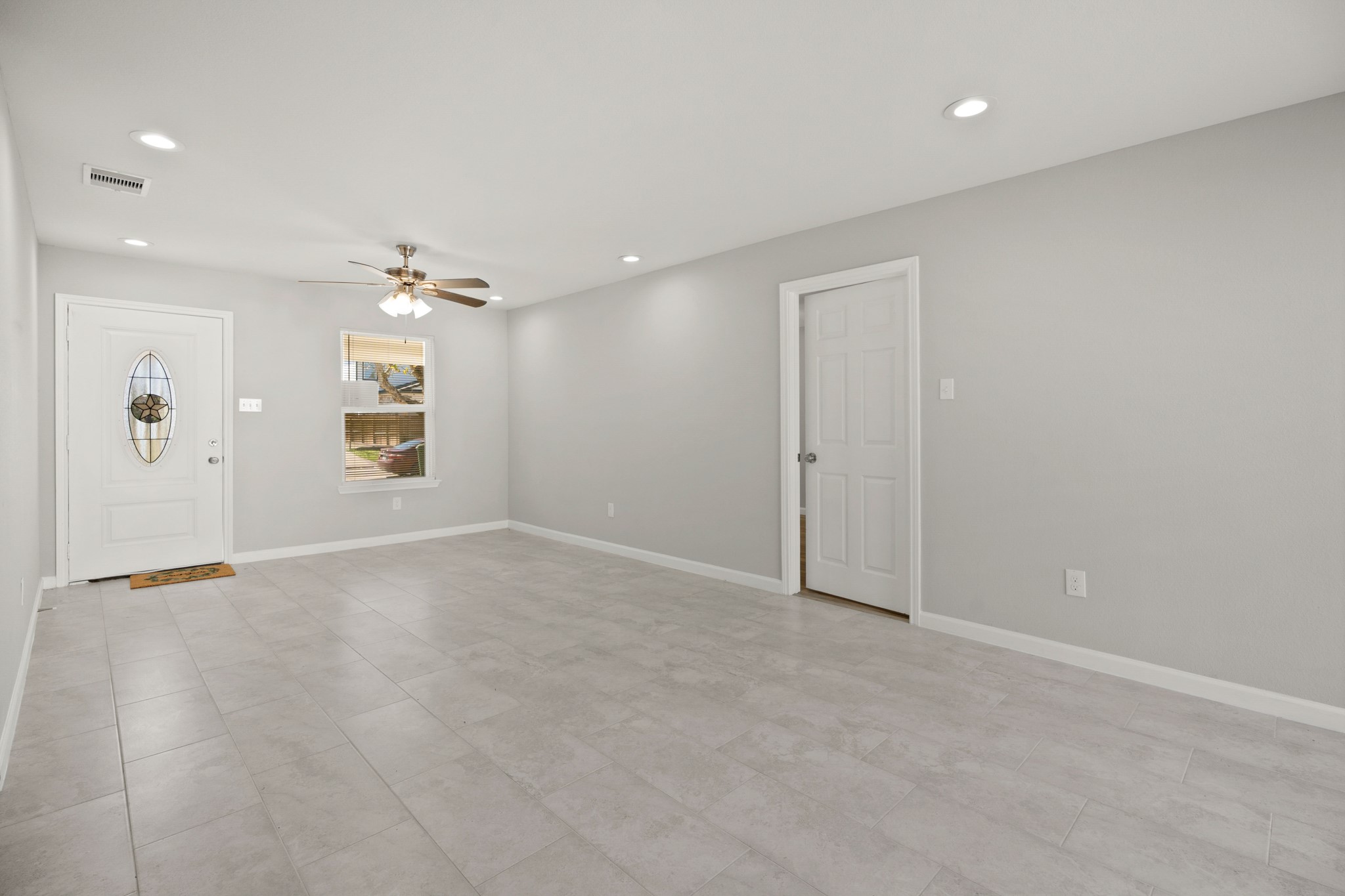 5123 Ridgeway Drive Houston, TX 77033 - Photo 2 of 21 You'll be instantly greeted by beautiful tile floors.