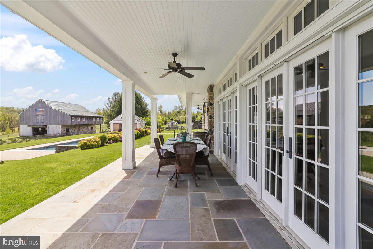182 Trythall Road Elverson, PA 19520 - Photo 28 of 76 Huge wrap-around PA bluestone patio