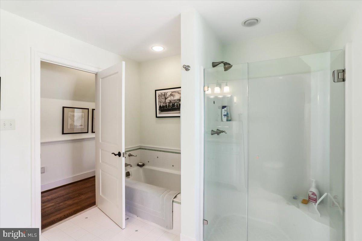182 Trythall Road Elverson, PA 19520 - Photo 42 of 76 a bathroom with a tub shower vanity and a sink