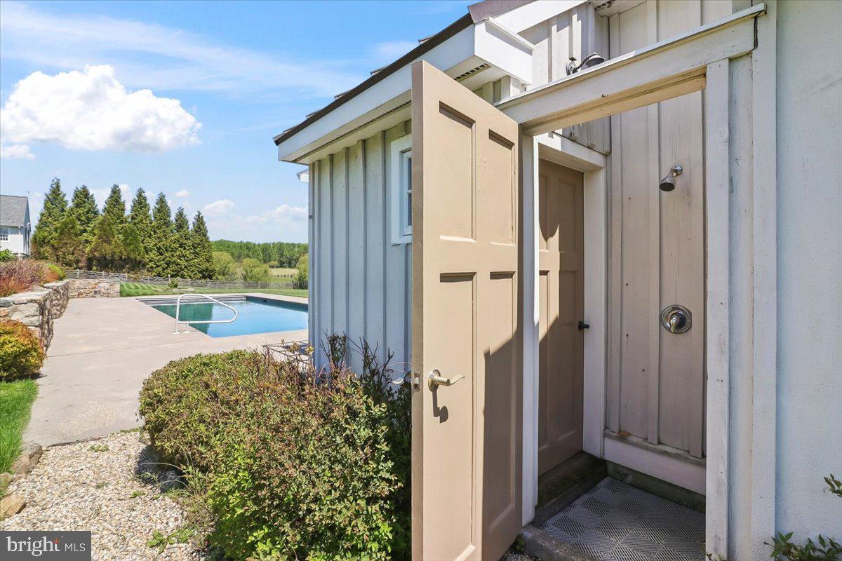 182 Trythall Road Elverson, PA 19520 - Photo 60 of 76 Shower on side of pool house