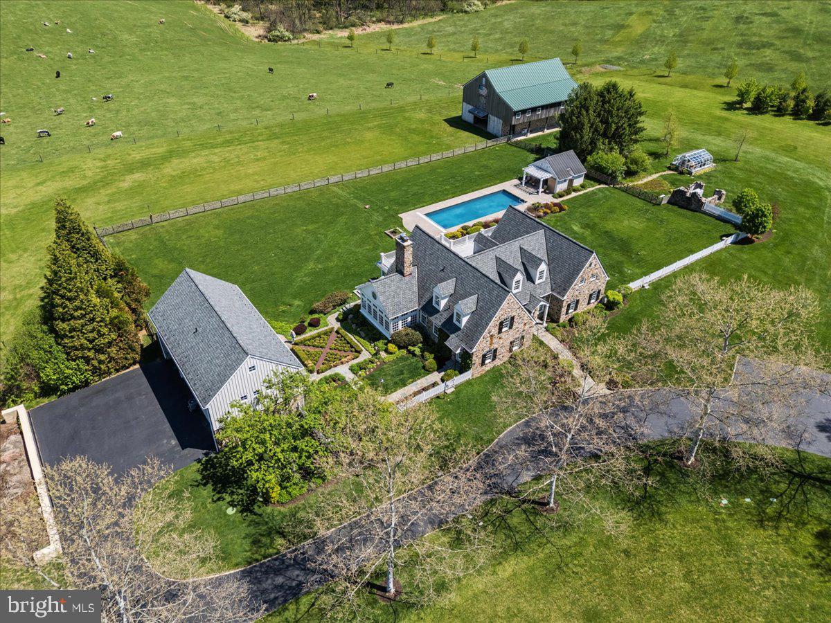 182 Trythall Road Elverson, PA 19520 - Photo 65 of 76 an aerial view of a house with garden space and street view