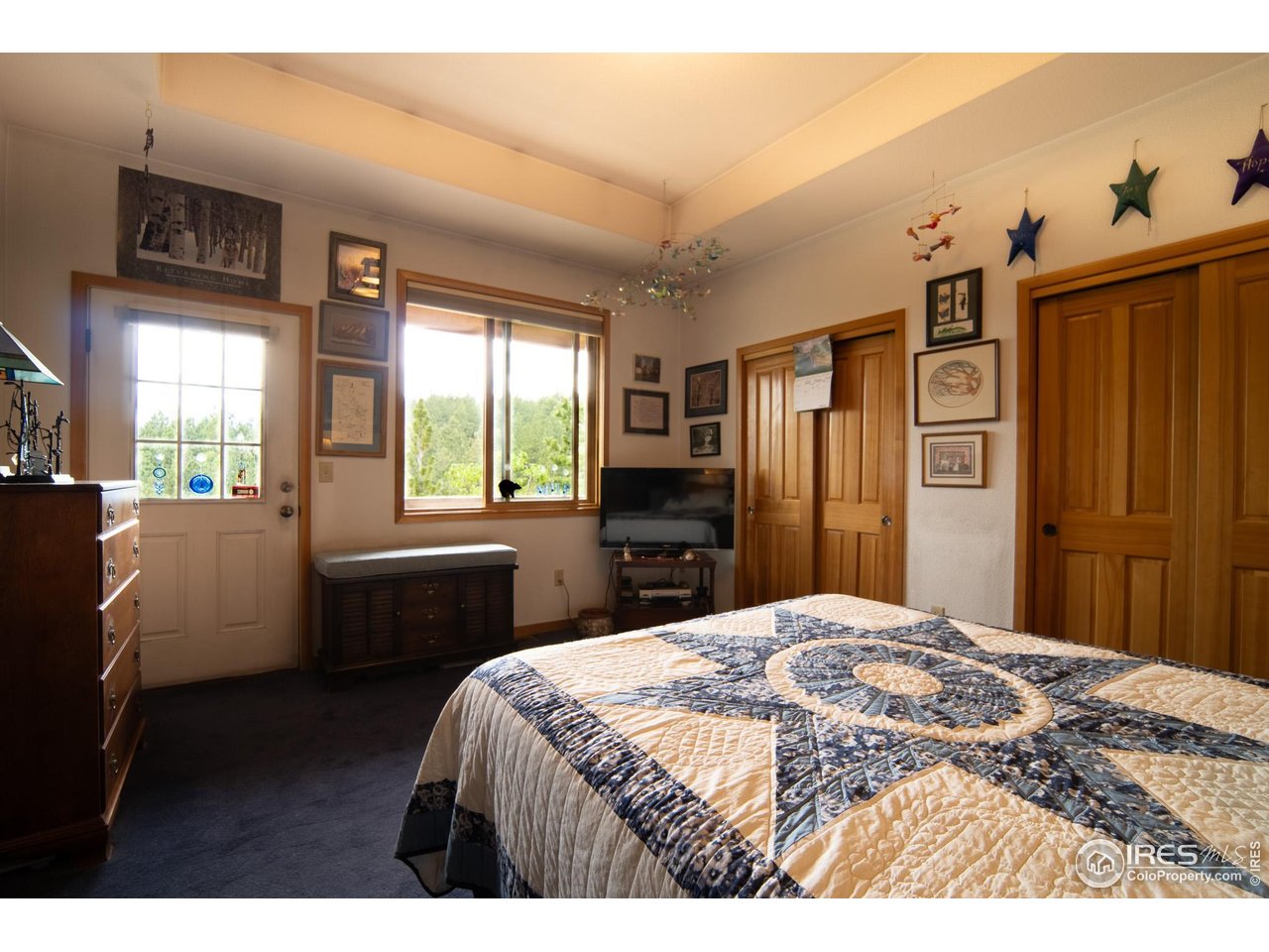 237 Puma Drive Boulder, CO 80302 - Photo 19 of 40 Primary suite opens to a deck for morning coffee and views