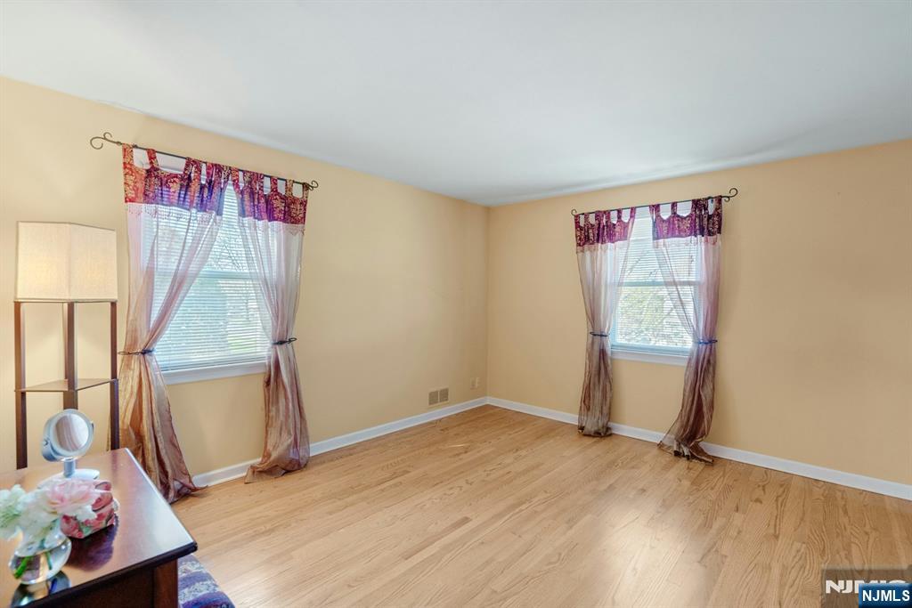 90 Arnot Place Paramus, NJ 07652 - Photo 13 of 32 an empty room with a window