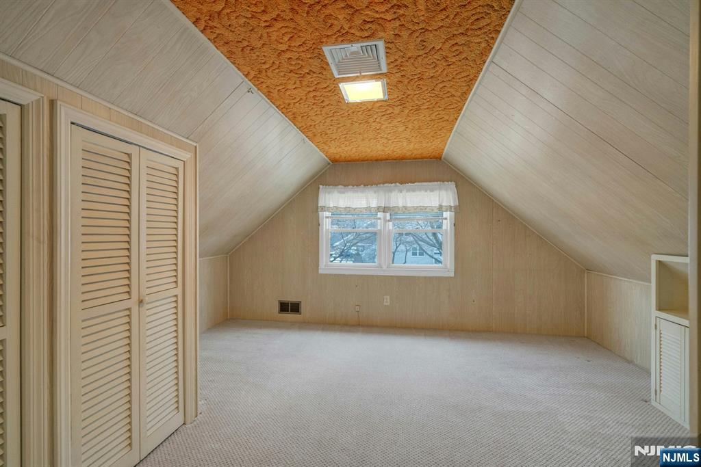 90 Arnot Place Paramus, NJ 07652 - Photo 17 of 32 an empty room with windows