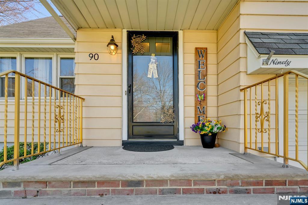 90 Arnot Place Paramus, NJ 07652 - Photo 2 of 32 a view of entrance gate of a building