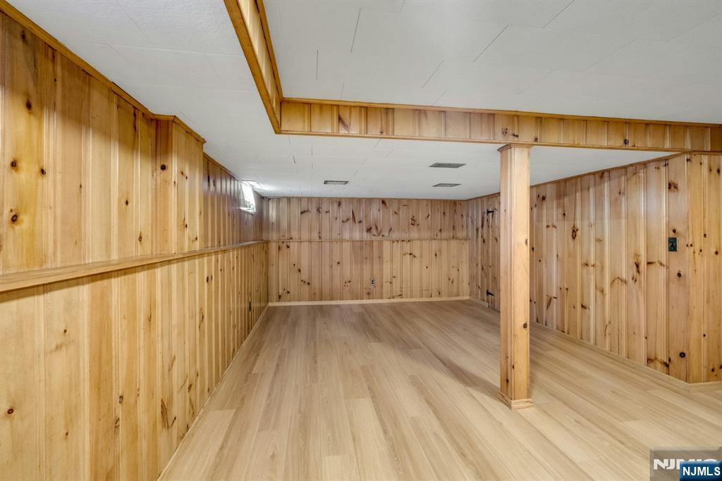 90 Arnot Place Paramus, NJ 07652 - Photo 21 of 32 a view of entryway with wooden walls