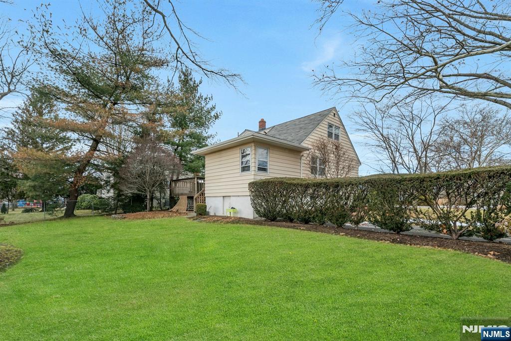 90 Arnot Place Paramus, NJ 07652 - Photo 24 of 32 a view of a house with a yard