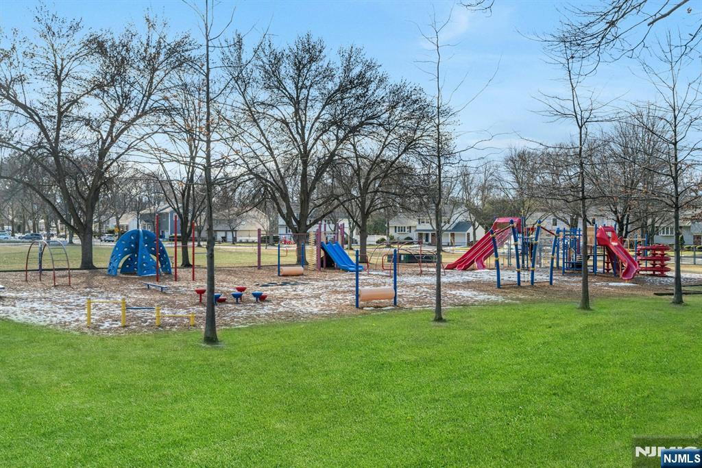 90 Arnot Place Paramus, NJ 07652 - Photo 26 of 32 a childrens park with lots of swings and slides