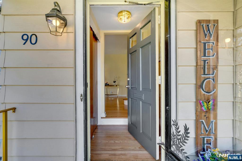 90 Arnot Place Paramus, NJ 07652 - Photo 3 of 32 a view of a entryway door of the house