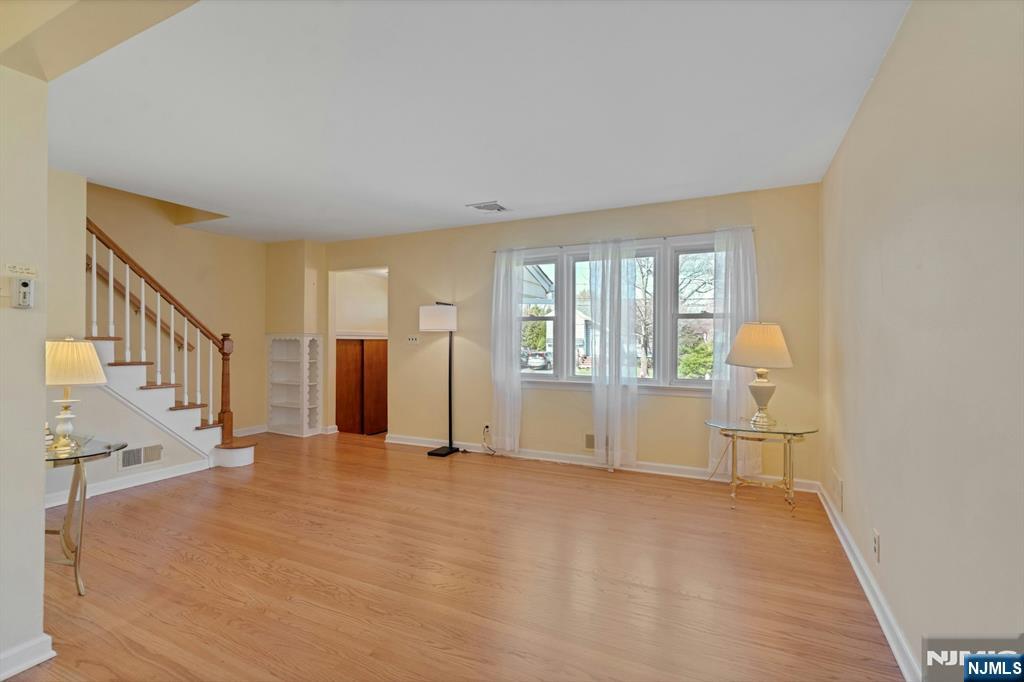 90 Arnot Place Paramus, NJ 07652 - Photo 6 of 32 a view of an empty room with a window