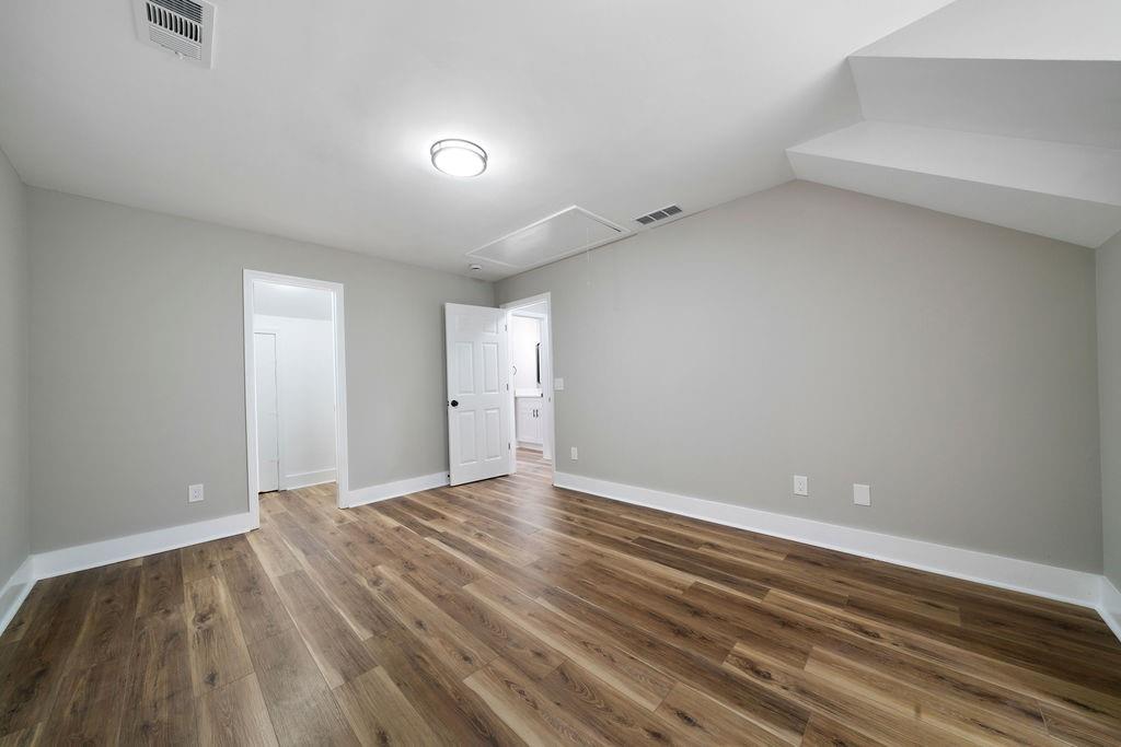 6488 Nebo Road Hiram, GA 30141 - Photo 26 of 32 a view of an empty room with wooden floor