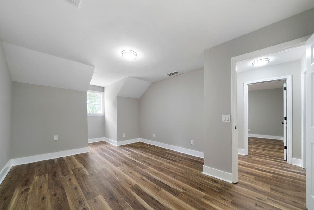 6488 Nebo Road Hiram, GA 30141 - Photo 28 of 32 wooden floor cabinet and windows in a room