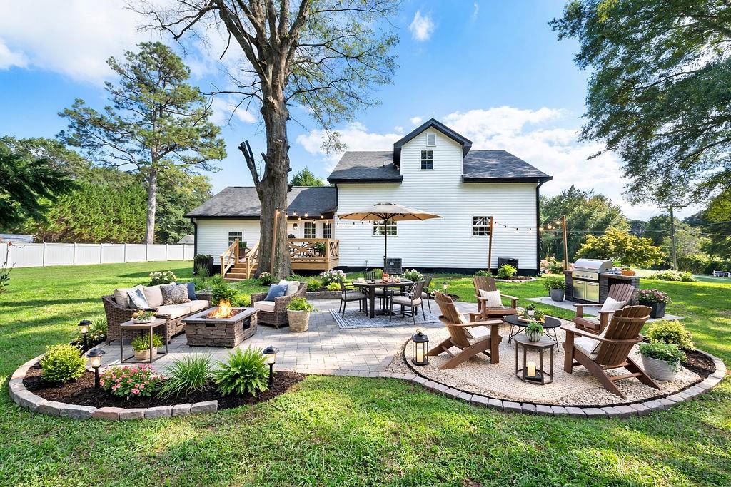 6488 Nebo Road Hiram, GA 30141 - Photo 30 of 32 a view of a house with backyard and sitting area