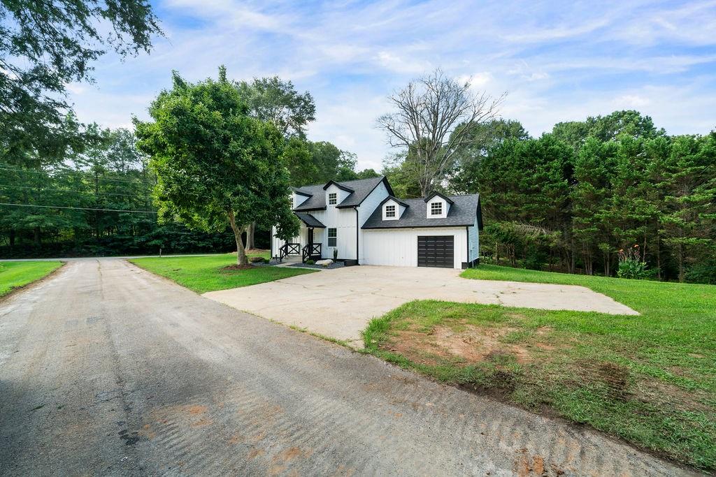 6488 Nebo Road Hiram, GA 30141 - Photo 3 of 32 a front view of a house with yard