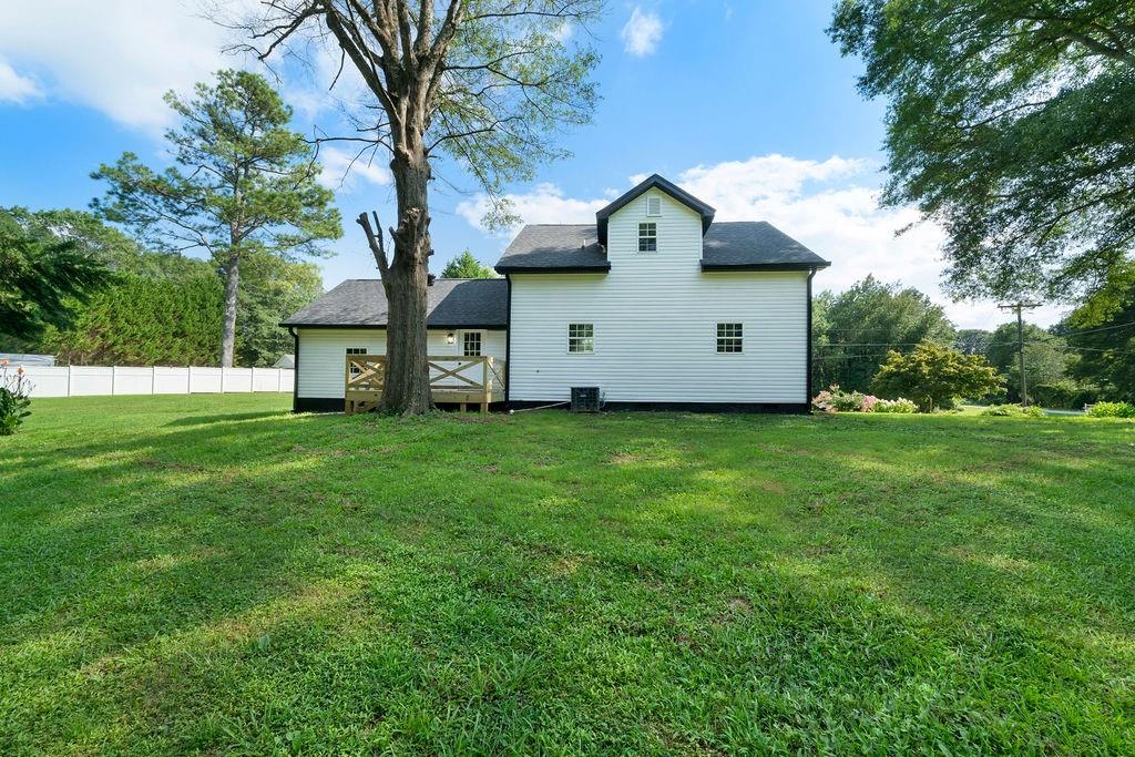6488 Nebo Road Hiram, GA 30141 - Photo 31 of 32 a view of a house with a yard