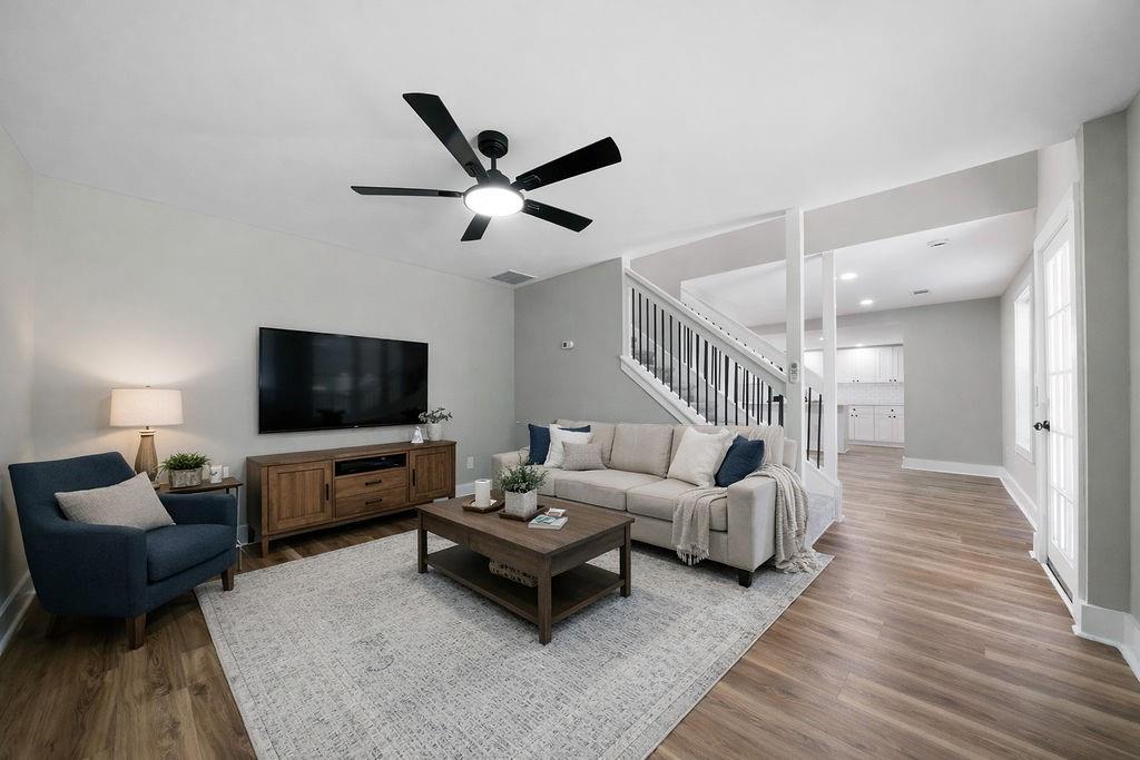 6488 Nebo Road Hiram, GA 30141 - Photo 6 of 32 a living room with furniture and a flat screen tv