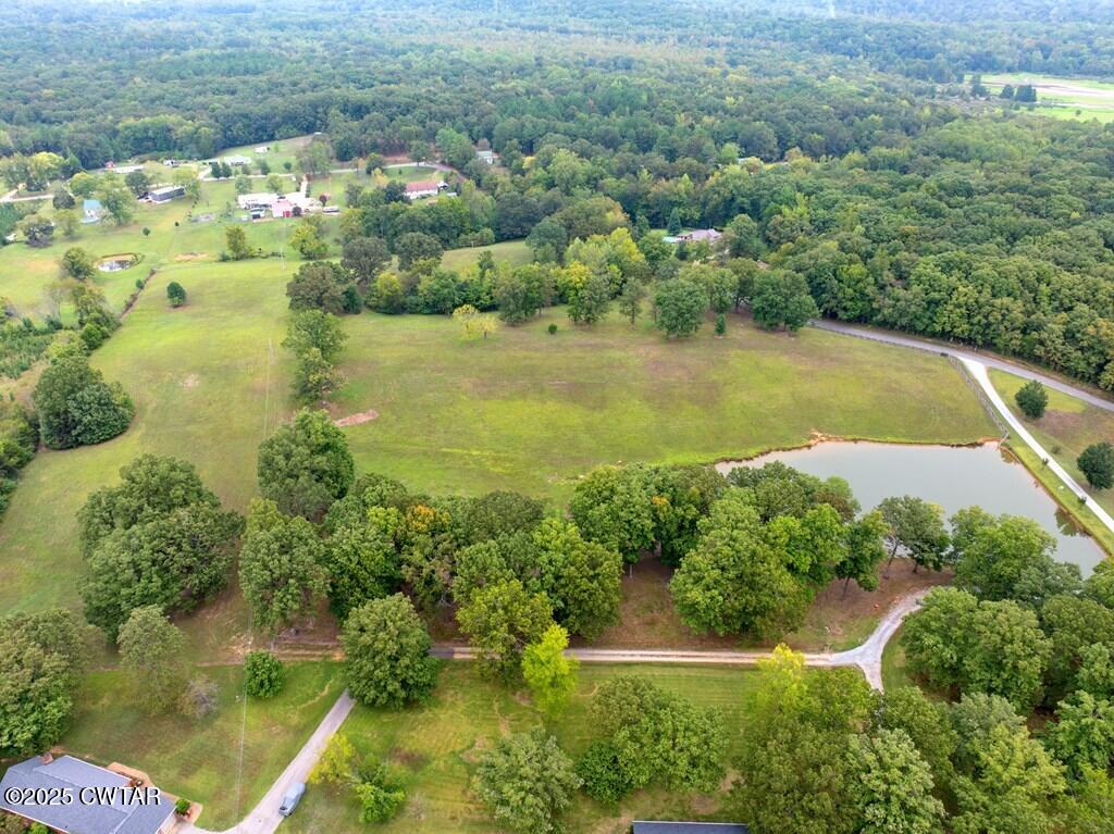 255 Hartley Road Camden, TN 38320 - Photo 22 of 79 an aerial view of residential houses with outdoor space and trees