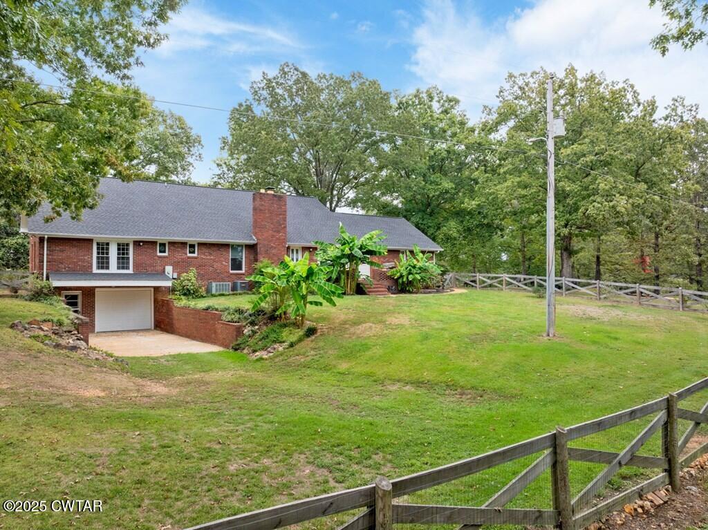 255 Hartley Road Camden, TN 38320 - Photo 7 of 79 a view of a house with a yard