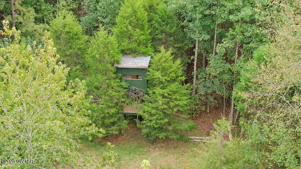 255 Hartley Road Camden, TN 38320 - Photo 76 of 79 a view of a house with a yard