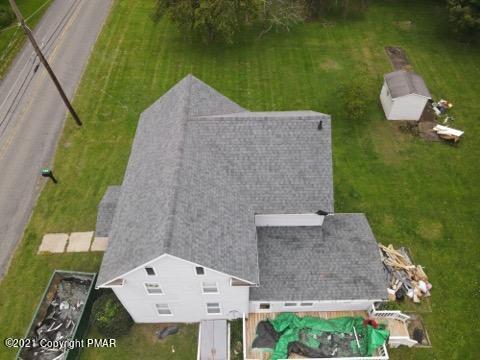 144 Merwinsburg Road Effort, PA 18330 - Photo 2 of 51 an aerial view of a house with a yard and lake view