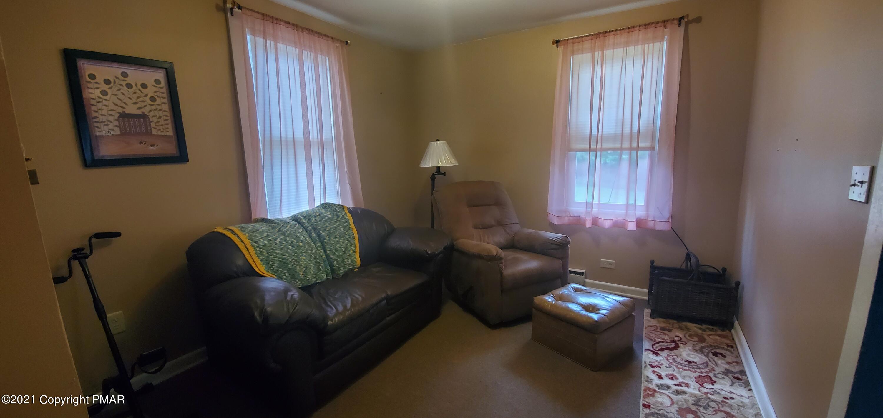 144 Merwinsburg Road Effort, PA 18330 - Photo 21 of 51 a living room with furniture and a window