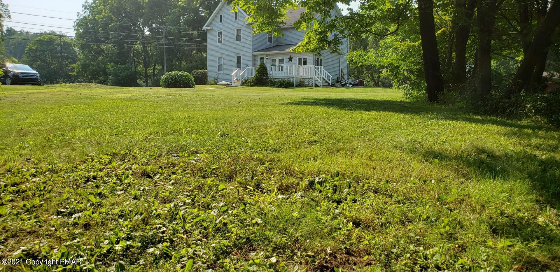 144 Merwinsburg Road Effort, PA 18330 - Photo 44 of 51 a view of a garden with large trees