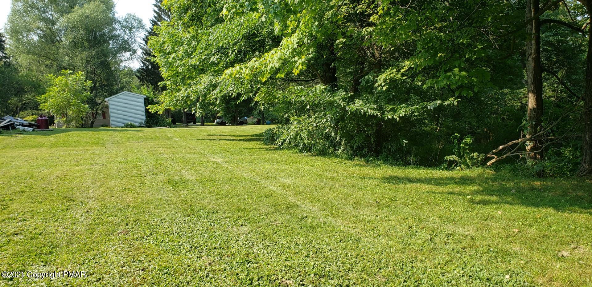 144 Merwinsburg Road Effort, PA 18330 - Photo 46 of 51 a view of a field with trees in the background