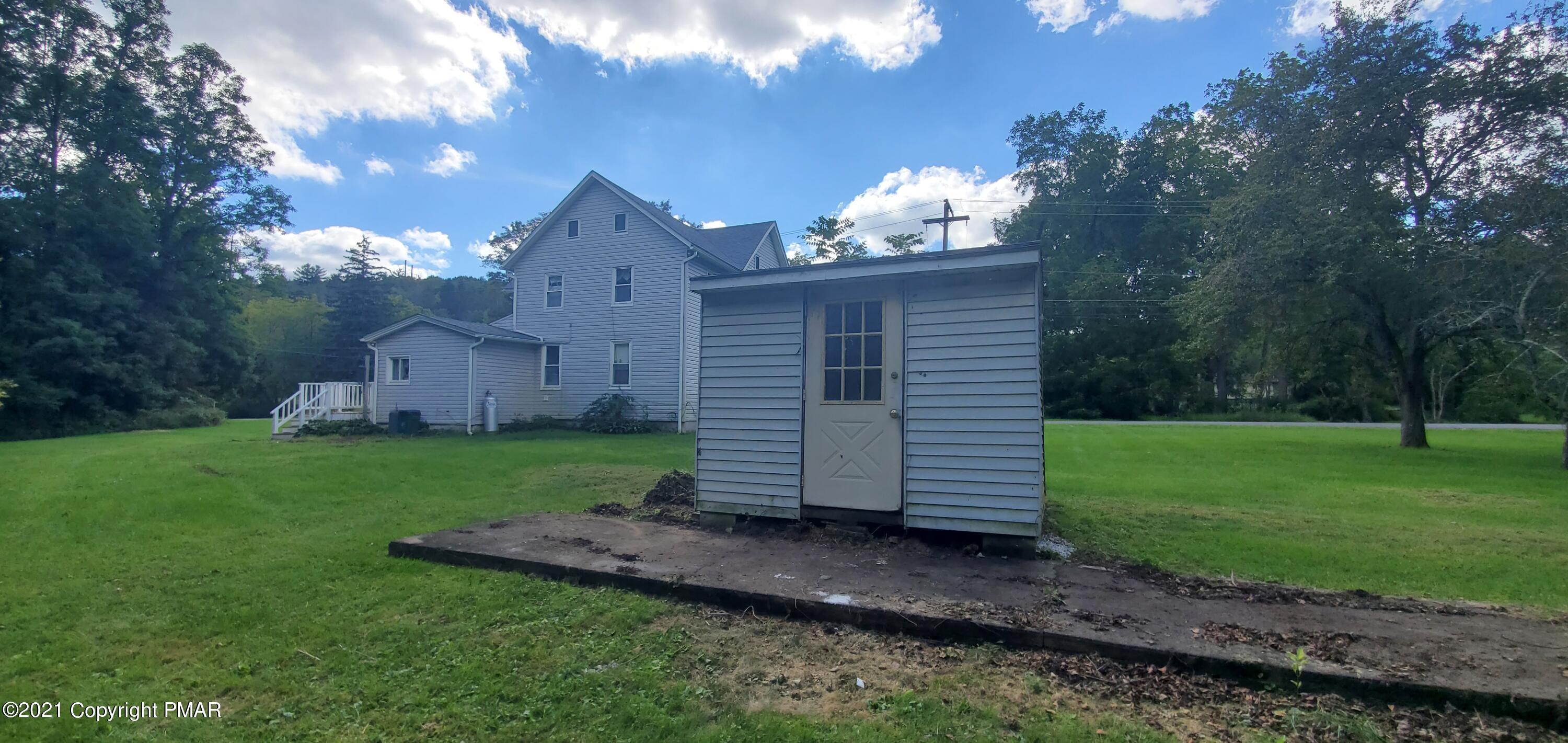 144 Merwinsburg Road Effort, PA 18330 - Photo 6 of 51 a view of a house with a yard and pathway
