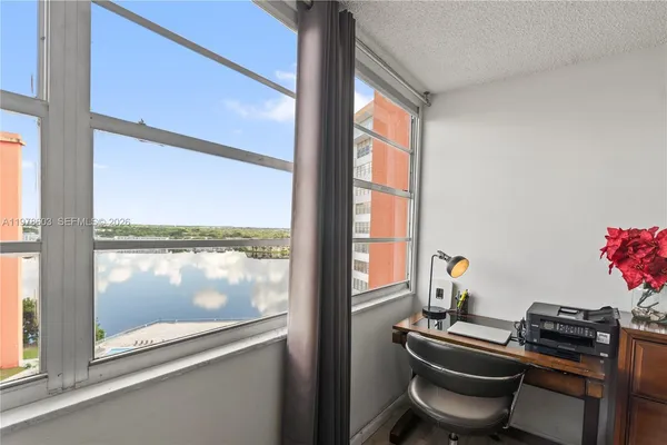 a room with furniture and a window