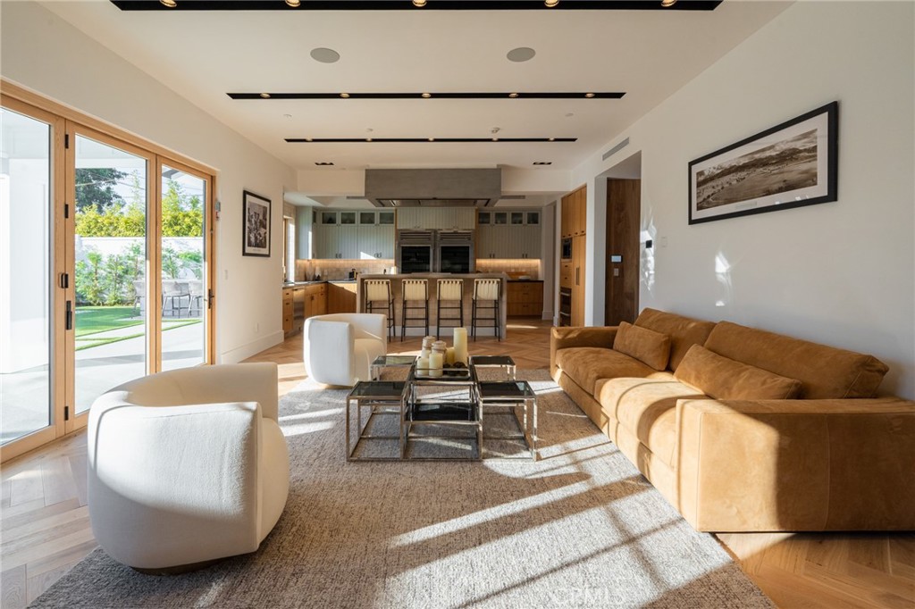 5131 Strohm Avenue Toluca Lake, CA 91601 - Photo 16 of 67 a living room with furniture and a large window