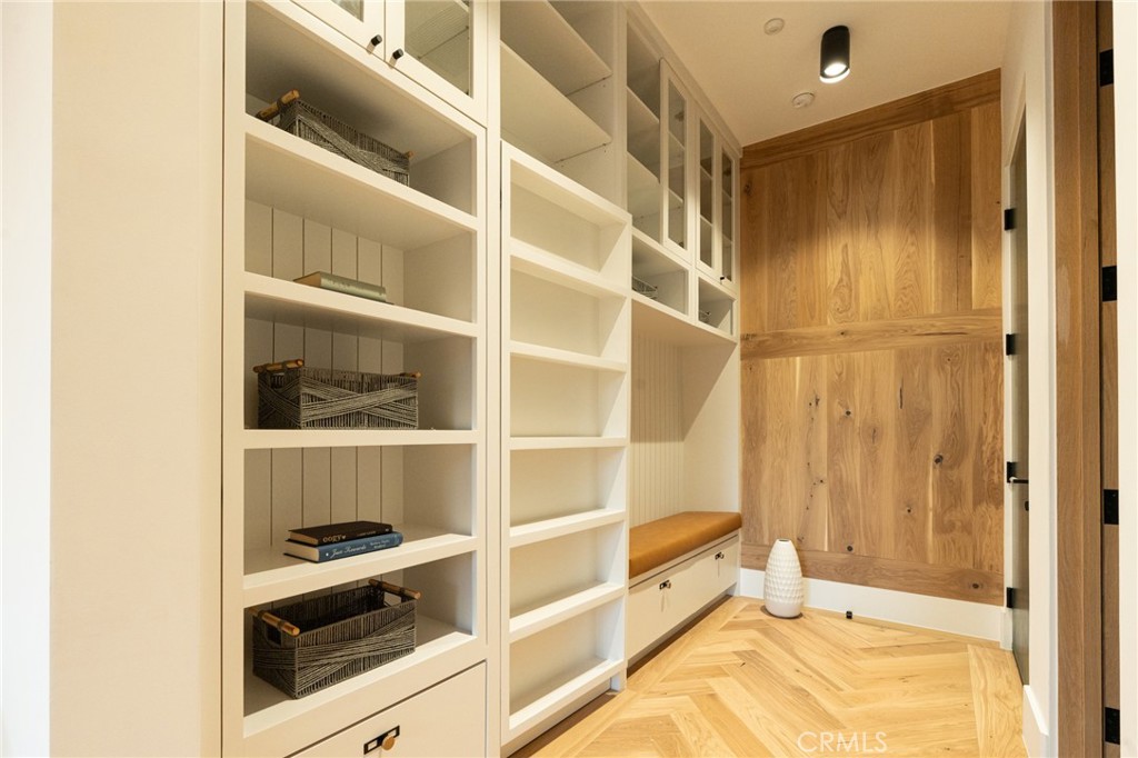 5131 Strohm Avenue Toluca Lake, CA 91601 - Photo 27 of 67 a view of walk in closet with empty racks