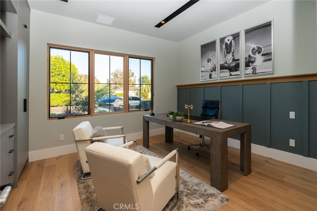 5131 Strohm Avenue Toluca Lake, CA 91601 - Photo 28 of 67 a view of a workspace with furniture and a window