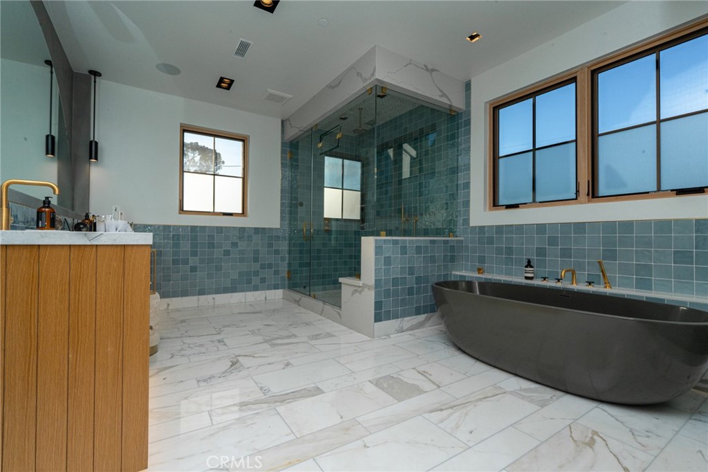 5131 Strohm Avenue Toluca Lake, CA 91601 - Photo 48 of 67 a kitchen with a sink and cabinets
