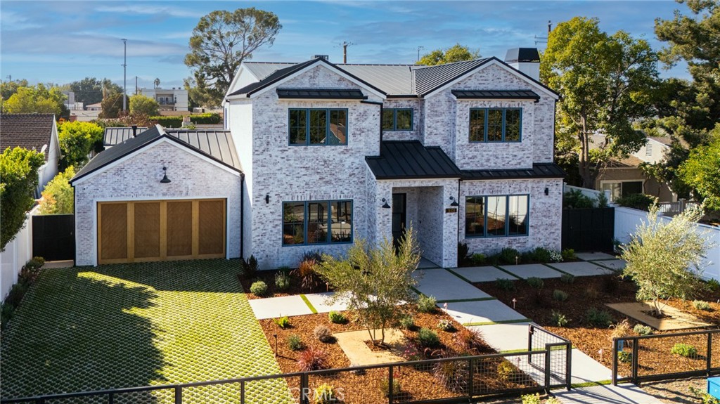 5131 Strohm Avenue Toluca Lake, CA 91601 - Photo 8 of 67 a front view of a house with a yard