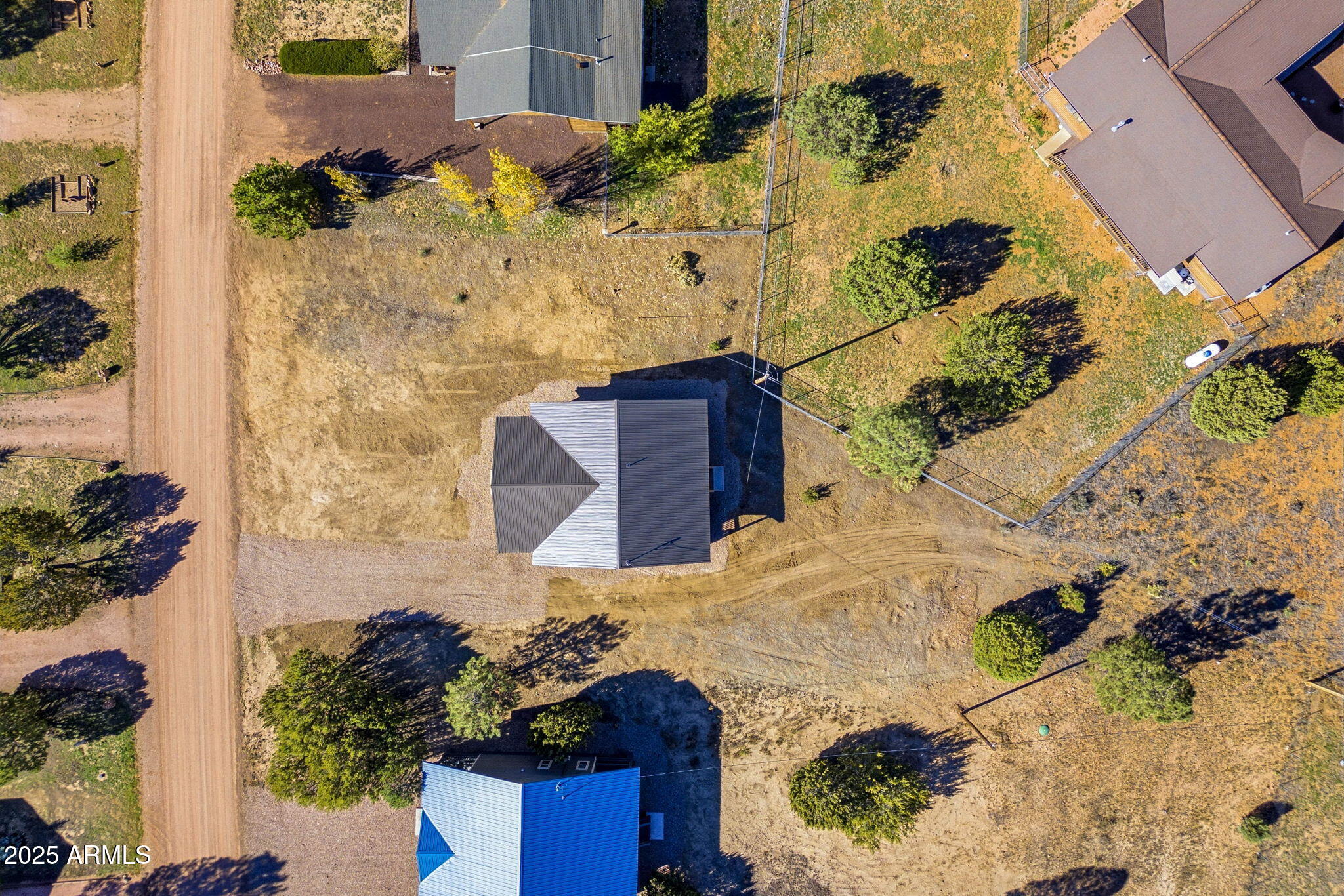 2224 Meadow Lane Overgaard, AZ 85933 - Photo 27 of 30 an aerial view of a house with a yard