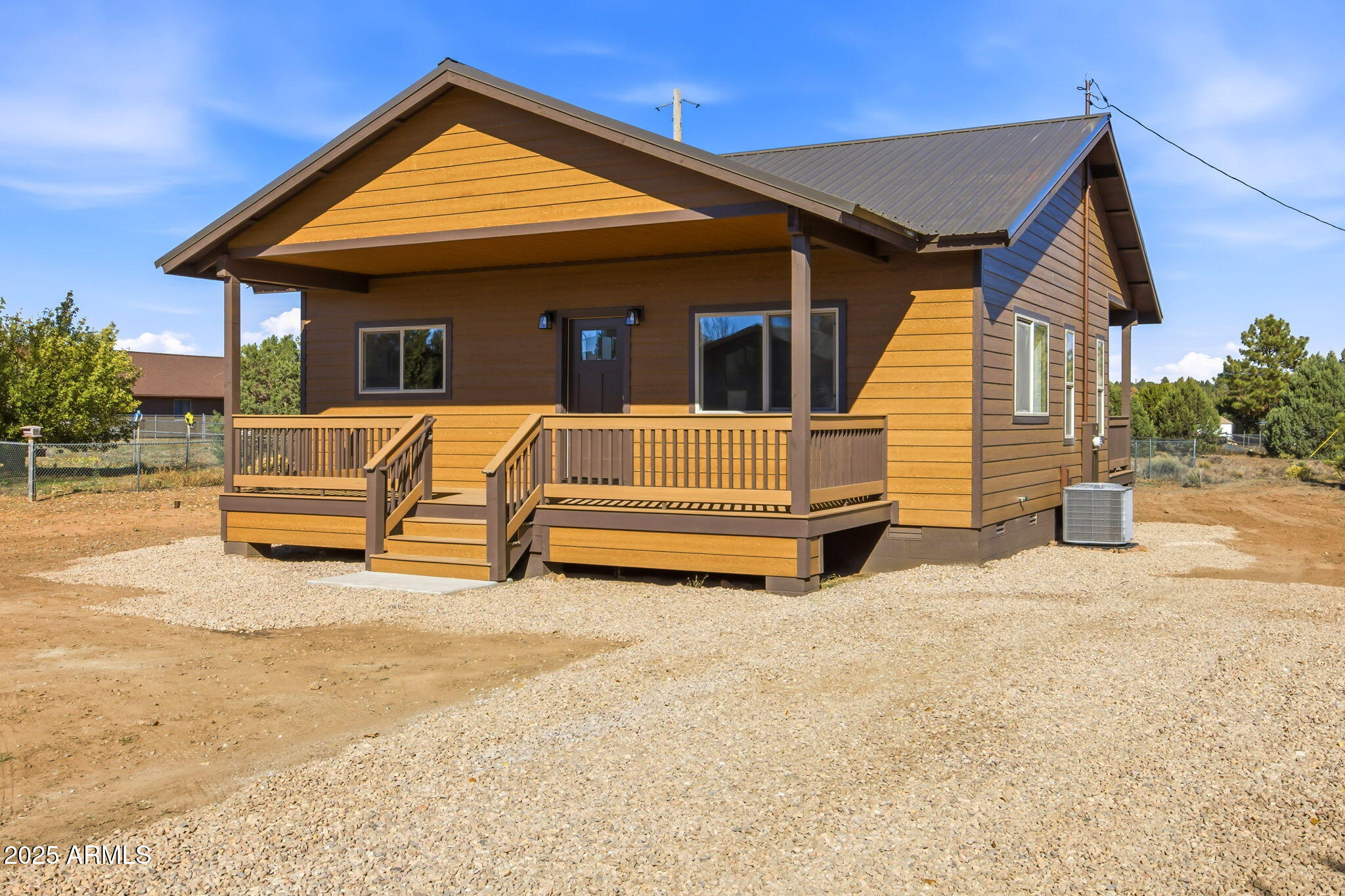2224 Meadow Lane Overgaard, AZ 85933 - Photo 29 of 30 a view of backyard with swimming pool and porch