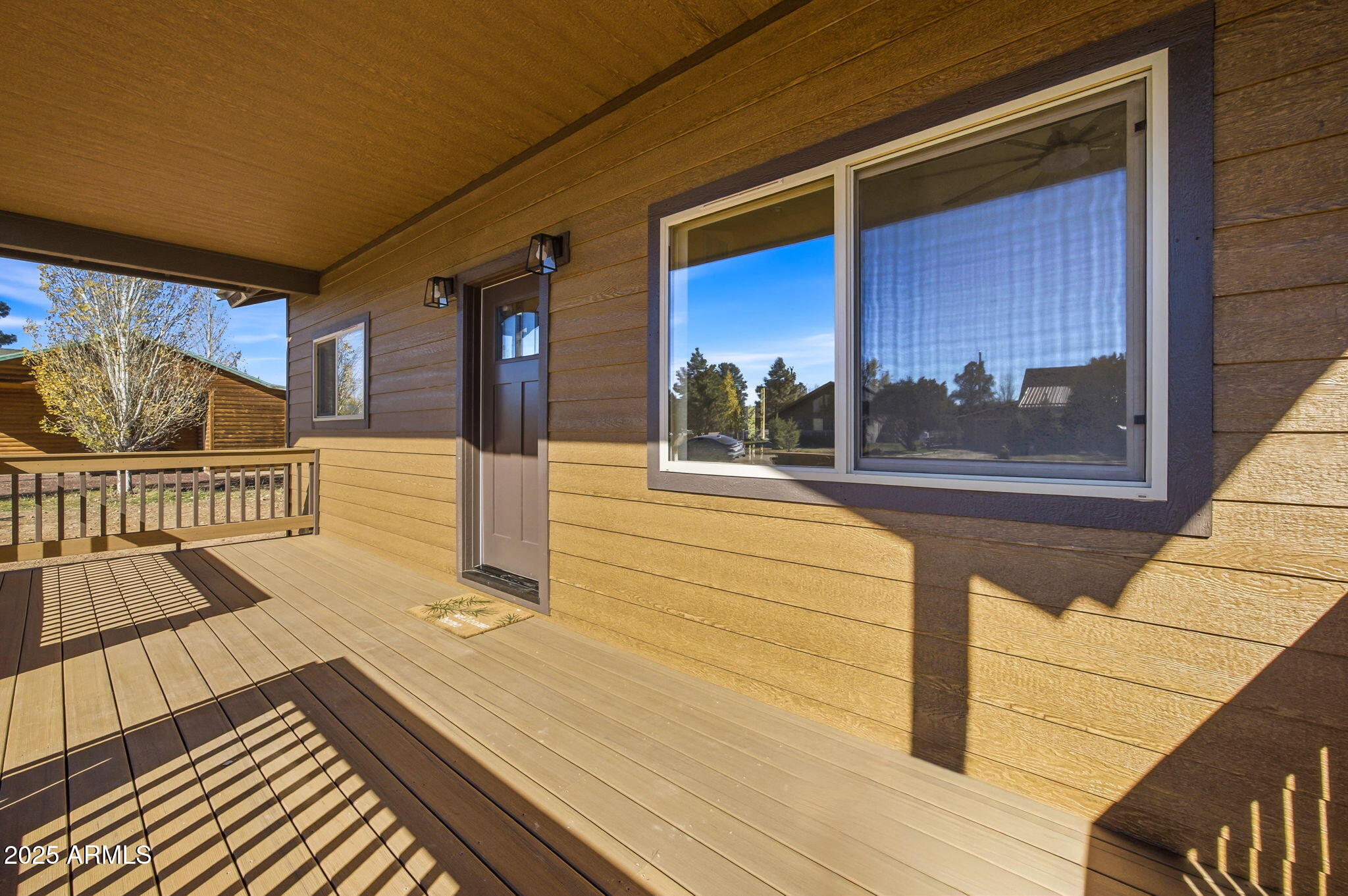 2224 Meadow Lane Overgaard, AZ 85933 - Photo 3 of 30 a view of a balcony with wooden floor