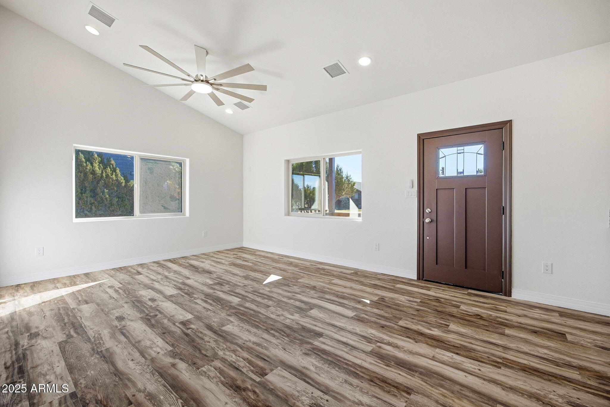2224 Meadow Lane Overgaard, AZ 85933 - Photo 6 of 30 a view of empty room with wooden floor
