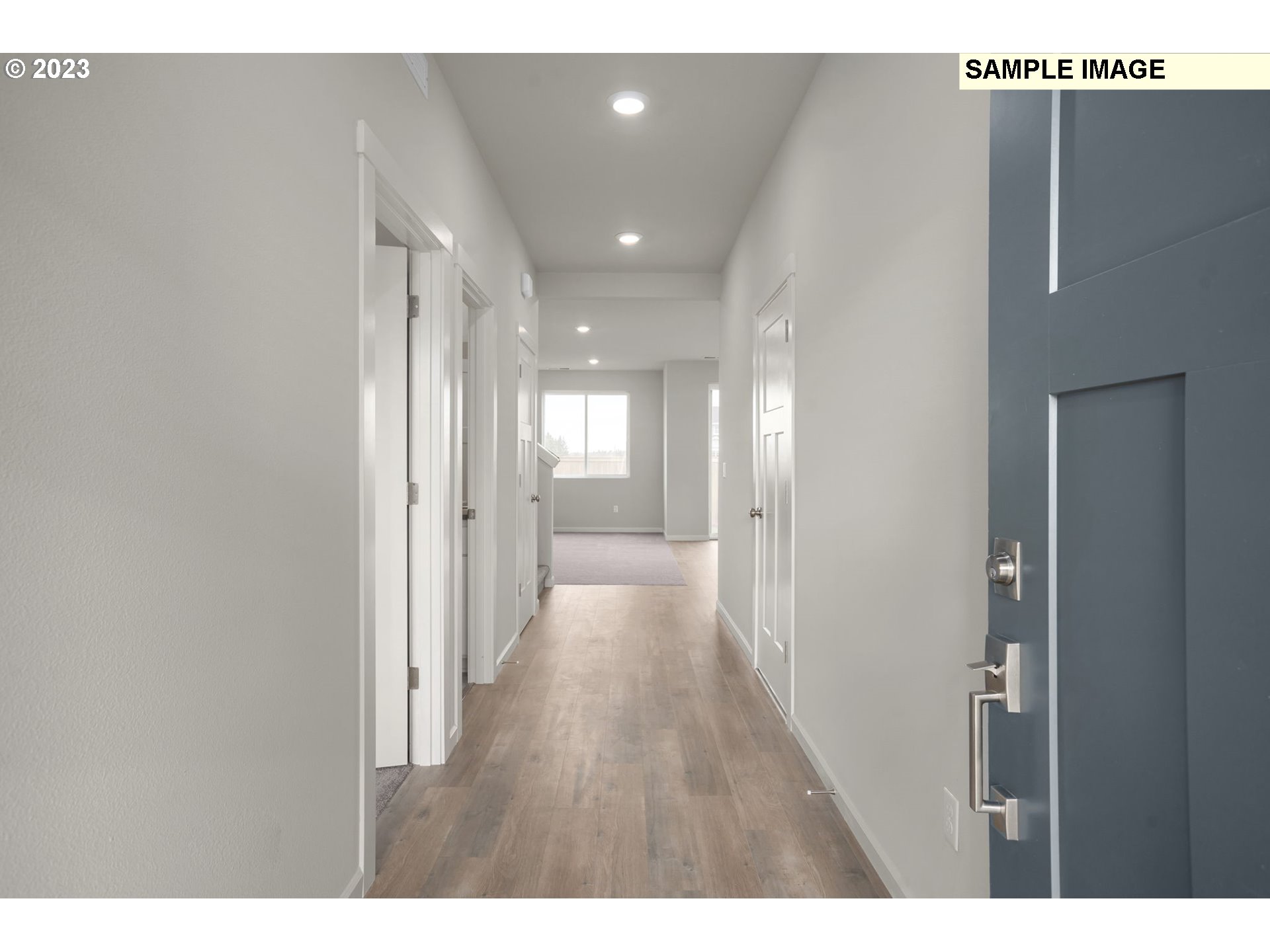 6162 Southeast 22nd Street Gresham, OR 97080 - Photo 2 of 17 a view of a hallway with wooden floor