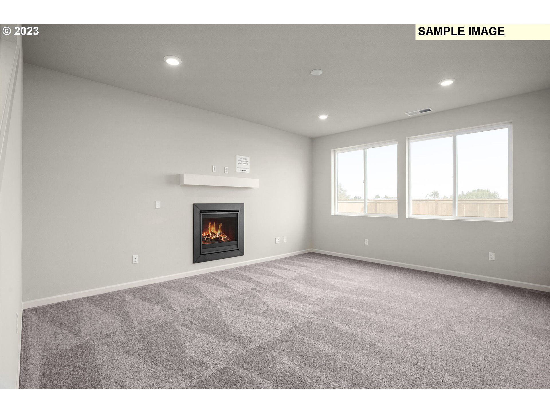 6162 Southeast 22nd Street Gresham, OR 97080 - Photo 5 of 17 a view of an empty room with a window and fireplace