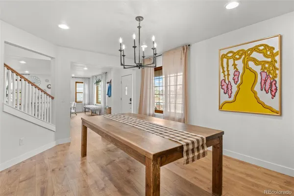 a very nice looking dining room with a kitchen island