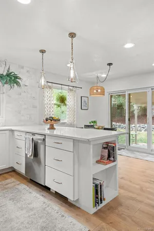 a kitchen with a stove and a sink