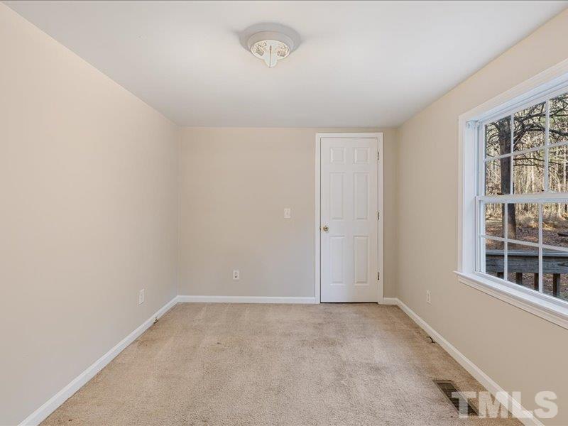 4010 Hurst Drive Franklinton, NC 27525 - Photo 20 of 32 an empty room with windows