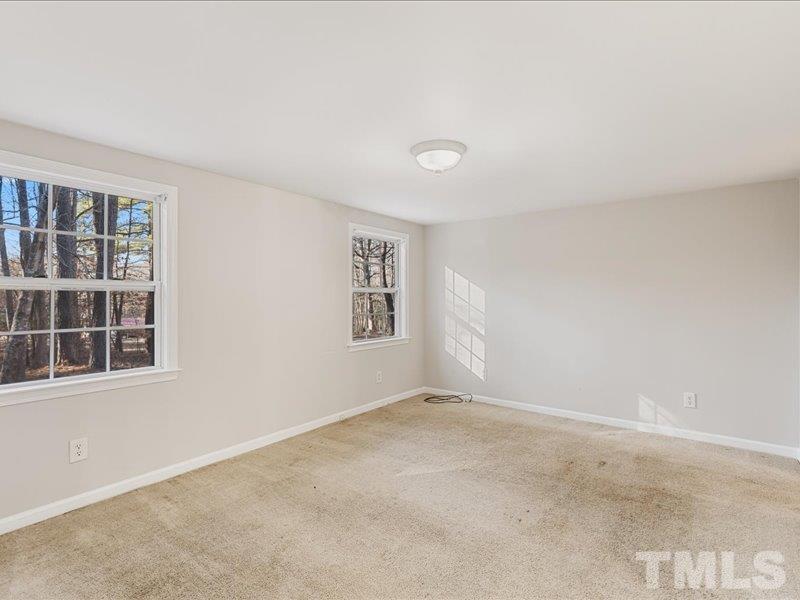 4010 Hurst Drive Franklinton, NC 27525 - Photo 23 of 32 an empty room with windows